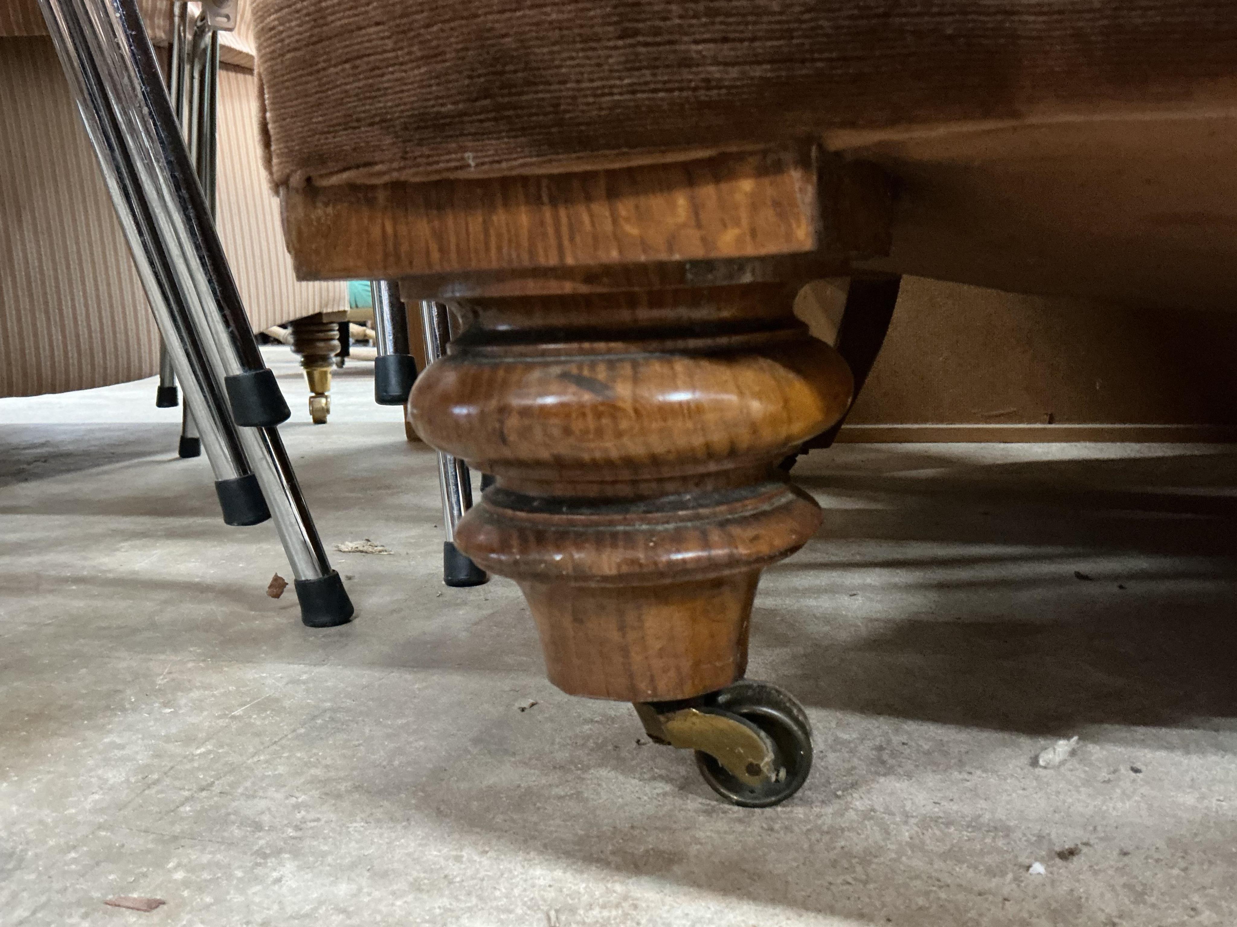 A Victorian upholstered Chesterfield settee, width 206cm, depth 82cm, height 66cm